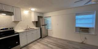 1 bed downstairs unit with courtyard, laundry access,brand new appliances, paint and flooring, includes all utilities up to 200 monthly Gallery 11