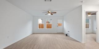 This beautiful single-story home has 4 bedrooms, 2 baths, vinyl flooring throughout, an open floor plan Gallery 11