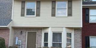 Spacious 3-Bedroom Townhome with Fireplace & Private Fenced Backyard Gallery 1