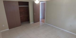 BEAUTIFUL 2/2/1 1000 Sq. Ft. with a large open floorplan, fenced yard and an enclosed lanai!! Gallery 6