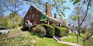 8/1 Fantastic Location. Fenced Yard. 4 bed 2 bath. Porch. Hardwood. Close to CMU Gallery 1