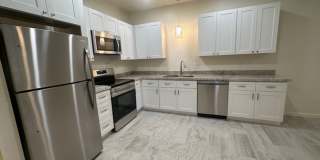 ELLIOT PLACE CONDOMINIUMS UPDATED/REMODELED GROUND FLOOR 1 BED PLUS DEN UNIT WITH 1 CAR GARAGE Gallery 10