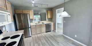 Welcome Home! Updated flooring & fresh interior paint! Move in OCTOBER! Beautiful 3X2 with attached 2 car garage! Lawn care included! Near E50!! Gallery 15