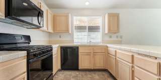 Vaulted Ceilings, Cozy Fireplace & Desirable Single-Story Living Near The Lakes! Gallery 13