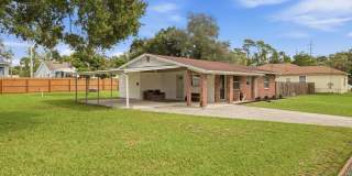 Tampa Home with Large Fenced Yard & Covered Parking Gallery 1