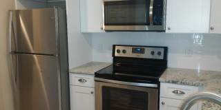 Completely Renovated 3rd Floor condominium with panoramic views GARAGE INCLUDED! Gallery 21