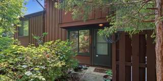 Tucked within the serene, tree lined setting of Covington, this contemporary townhome offers a refined sense of privacy paired with modern design. Gallery 1