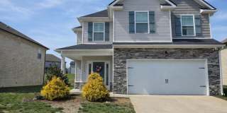 Get ready to fall in love—this sleek, modern beauty in West Creek Farms is bringing the wow factor to Clarksville! Gallery 1