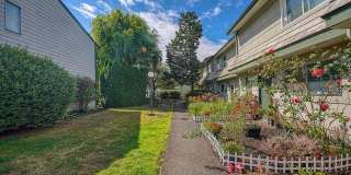 NW Vancouver Condo with Detached Garage & Dedicated Parking Gallery 1