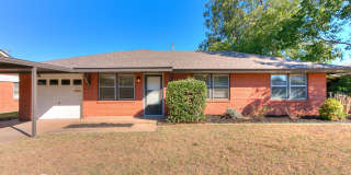 Clean 3 bed 2 bath brick home with garage and shop for lease Gallery 1