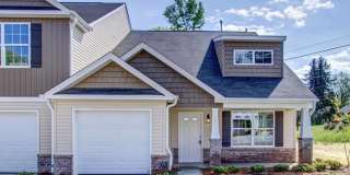 Modern End-Unit Townhome with Main-Level Primary Suite & Loft in Strawberry Creek Gallery 1