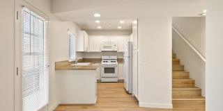2 Bedroom 1.5 Bath townhouse with private balcony and 2 car garage Gallery 1