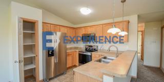 Beautiful 2-Bedroom West-Side Condo with Garage & Utilities Included! Beautiful 2-Bedroom West-Side Condo with Garage & Utilities Included! Gallery 1