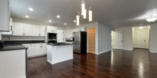 Grand 5 Bedroom Home Featuring 19ft Ceilings, Family Room & Main-Level Suite Gallery 22