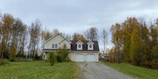 Fantastic 5 bedroom, 2.5 bath with an oversized 2 car garage, home on a private Acre, for rent across from Seymore Lake! Gallery 1
