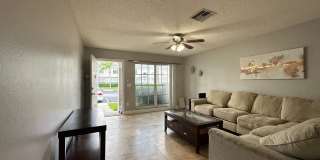 Beautiful Townhome in a gated community with assigned parking spots and a community pool Gallery 4