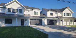 Brand New 4 Bed 3 Bath Modern Farmhouse Style Duplex in Mead with over 1850 Sq. Ft. on Huge Lot. Gallery 1