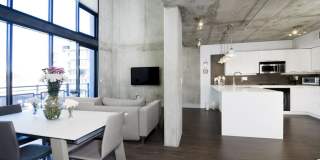 Modern condo in the prestigious DOMA building! Gallery 1