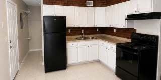 Charming 2BR Home with Enclosed Porch, Carport & Storage Shed Gallery 4
