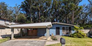 Country living in the City - Huge bonus room, entertainment deck, covered lanai and lots of storage. Gallery 1
