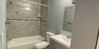 1/1 in the Heart of Brandon with a lake view! Gallery 4