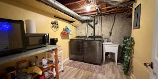 Quiet Ranch Retreat Steps from Light Rail with Finished Basement & Designer Kitchen Gallery 16