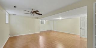 Spacious 2BR/2BA Corner Unit with Finished Basement, Private Patio & Garage Gallery 13
