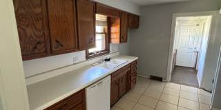 Charming 3-Bedroom Stone Home with Spacious Yard Gallery 5