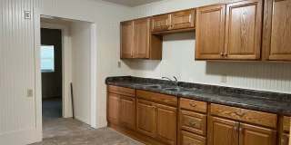 **Available Immediately** 4 bedroom / 1 bath home located near Washburn University Gallery 7