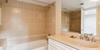 5 BR 4.5 BA home with inground heated pool and extensive hardscape! Gallery 41
