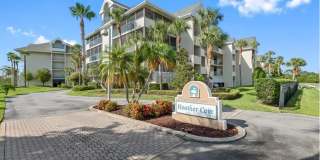 All Utilities Included! 2BR/2BA Condo with Water View, Screened Balcony & Heated Pool Gallery 1