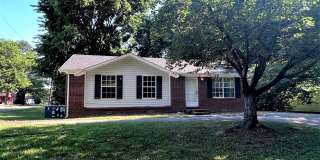Charming Brick Home with Back Deck! Gallery 1