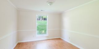 Spacious 3 bedroom home in desirable SW Durham! Super dog friendly with large fenced yard! Gallery 27
