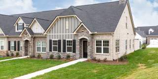 **BE THE LUCKY ONE TO LIVE IN THIS 2022-BUILT UPSCALE COTTAGE HOME IN THE PRESERVE AT BELLE POINTE** Gallery 1