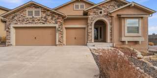 Stunning 5-Bedroom Rancher in Flying Horse!! Gallery 1