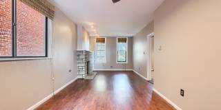 Unique 2BR Downtown Brick Rental – Bonus Space + Backyard Gallery 7