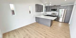 Stylishly Remodeled 2BD/1.5BA with Private Yard & In-Unit Laundry Gallery 1
