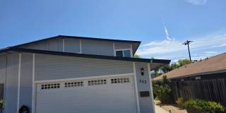 Large 4 bedroom 2 bath home with downstairs bedroom and attached garage Gallery 1