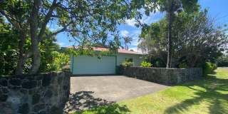 2 bedroom, 2.5 baths Home featuring a 2-car garage and great covered lanai. Walking Distance to Hawi Gallery 1