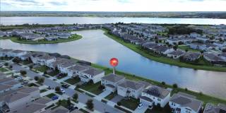 Beautiful Lake View 5 bedrooms Single Family Home with screened patio! Gallery 1