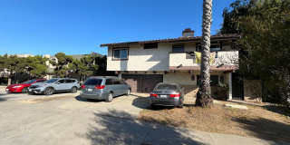 Cozy 2nd story apartment in the heart of City Heights. Vaulted ceilings, fireplace, onsite laundry Gallery 1