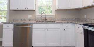 Welcome to this beautiful newly renovated 3-bedroom brick ranch! Gallery 9