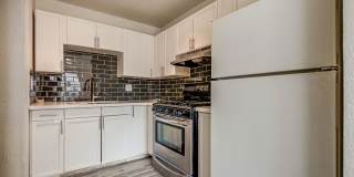 Charming Single-Level Townhome with Modern Flooring & Update Bathroom & Kitchen Gallery 1