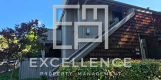 1/1 Condo with Vaulted Ceilings, Community Pool, Parking, Fireplace and Updated Throughout! Gallery 1