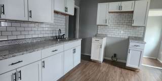Newly Renovated Columbus Gem with Bright Sunroom and Large Fenced Yard Gallery 3