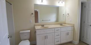 Spacious 3 Bedroom, 3.5 Bathroom Townhome with Finished Basement, Fenced Yard & Garage Gallery 28