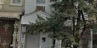 5BR/1.5BA Row Home with Backyard and Laundry Hookups Gallery 49