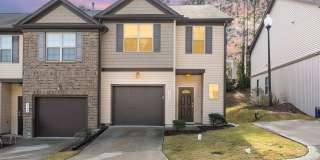 Welcome home! This pristine, end-unit townhome combines modern comfort, thoughtful upgrades, and low-maintenance living in an unbeatable Holly Springs location. Gallery 1