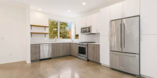 3 Bedroom Modern Industrial Townhome with City Views & Rooftop Oasis Gallery 1
