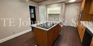 Spacious One Level Home with Den, Granite Kitchen Island, and 2 Car Carport Gallery 16